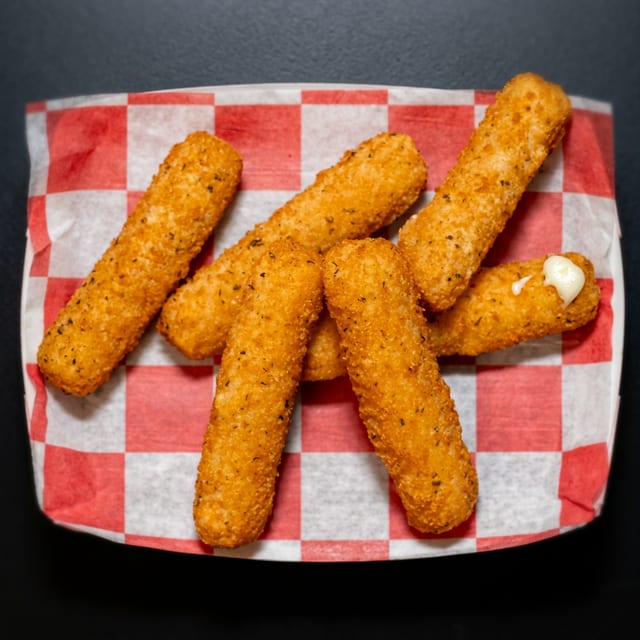 12 Pcs Mozzarella Sticks.