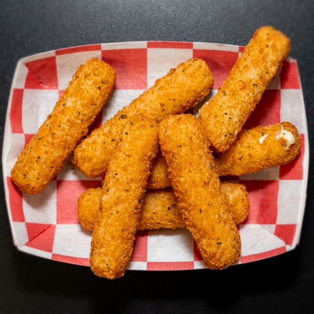 12 Pcs Mozzarella Sticks.